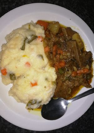 A picture of Pap and beef stew.