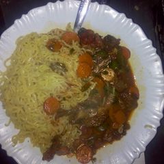 A picture of Indomie with beef stew.
