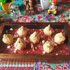 A picture of Stuffed Til Ginger Modak.