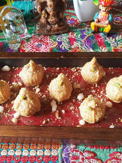 A picture of Stuffed Til Ginger Modak.