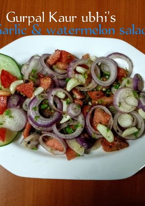A picture of Garlic & watermelon salad 🍉🧄🧅🌱.