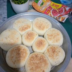 A picture of Chicken filled bun.