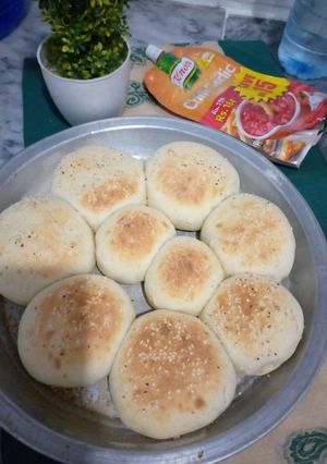A picture of Chicken filled bun.