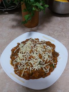 Una foto de Berenjenas en salsa con queso