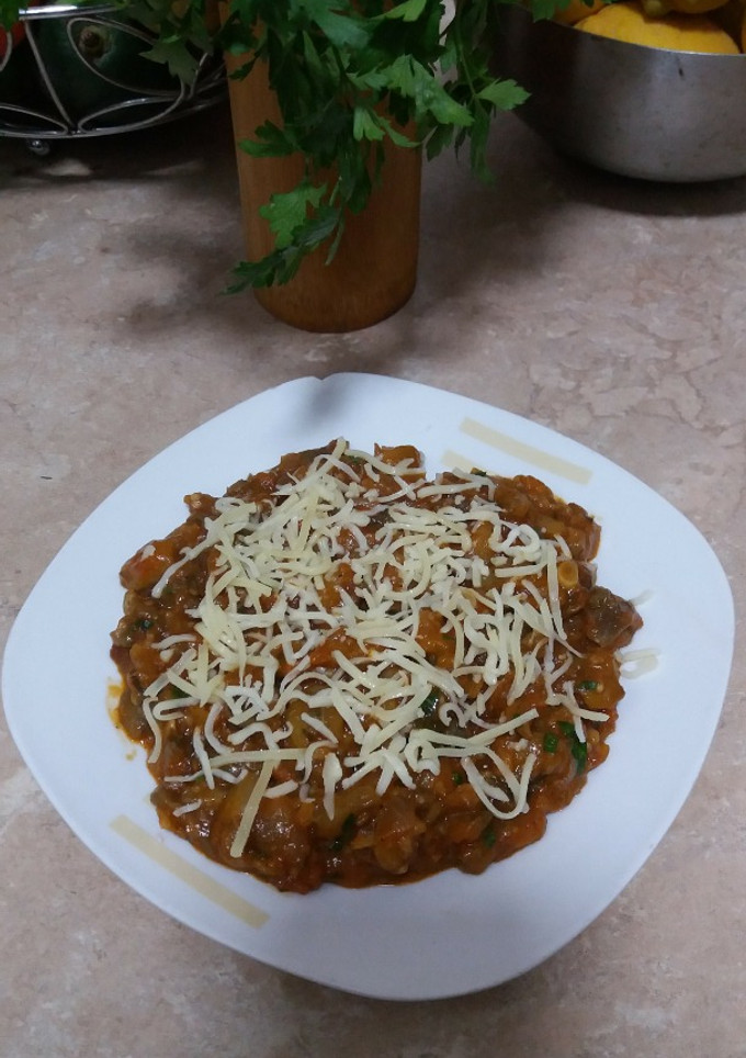 Una foto de Berenjenas en salsa con queso