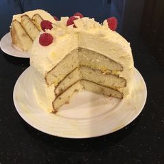 A picture of Vanilla Layer Cake filled withLenon and Rasberry and frosted with Fresh Lemon Cream.