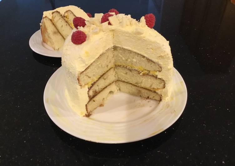 Vanilla Layer Cake filled withLenon and Rasberry and frosted with Fresh Lemon Cream