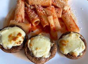 Una foto de Champiquesos con rigatoni