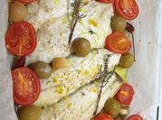 Una foto di orata al forno al sale