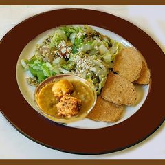 A picture of Fried Pearled kodo millet with Bok choy.