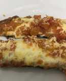 Milanesa de zucchini con tomate y mozzarella