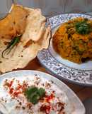 Kathyawadi masala vegetable khichadi with masala curd, papad and 🌶