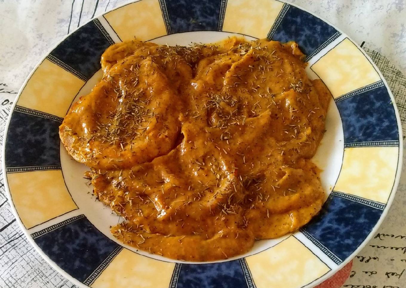 Lomo de cerdo en salsa de higos y melocotones