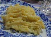 Una foto de puré de batata y papa