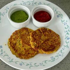 A picture of Lobia chilla loaded with veggies.