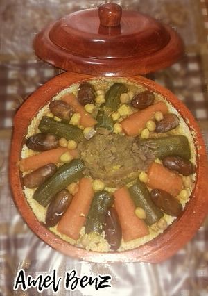 A picture of Couscous with Vegetables and Meat.
