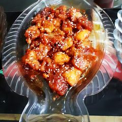A picture of Schezwan Sticky Fish 🐋.