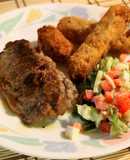 Bistec  y ensalada con yucas fritas