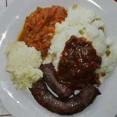 A picture of Simple dinner with tasty gravy.