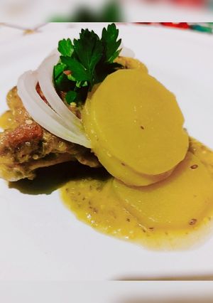 Una foto de Pollo en salsa verde de tomatillo