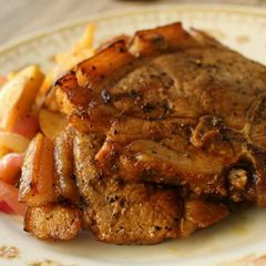 A picture of Grilled Pork Chops with Sauted Apples.
