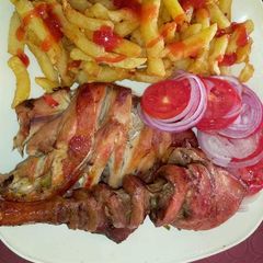 A picture of Chip's, deep fry chicken and Kachumbari.