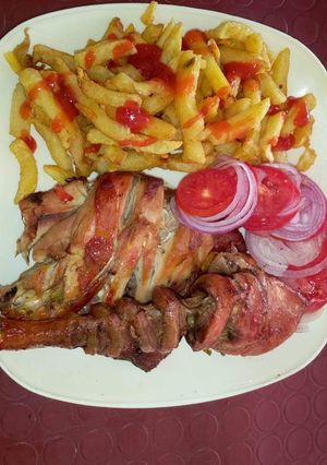 A picture of Chip's, deep fry chicken and Kachumbari.