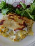 Lasanha de bacalhau com alho francês e cenoura ralada