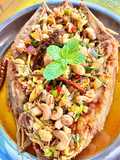 Fried Sea Bass with Spicy Herb Salad (Pla Kapong Lui Suan)