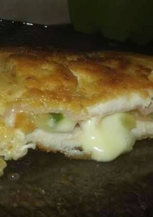 Una foto de Milanesa rellena casera