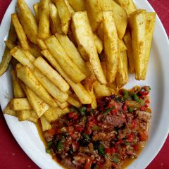 A picture of Spicy fried yam With sardine sauce.