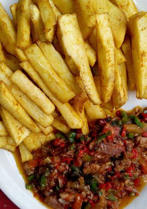 A picture of Spicy fried yam With sardine sauce.