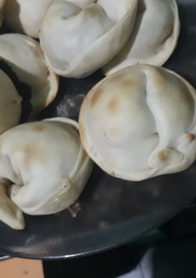 Una foto de Empanadas de cebolla y queso