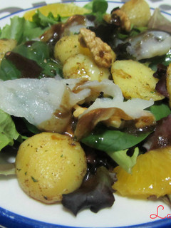 Una foto de Ensalada templada de bacalao y naranja