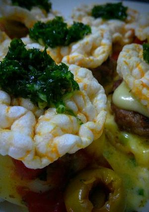 Una foto de Tapitas de arroz con centro de carne y mozzarella!