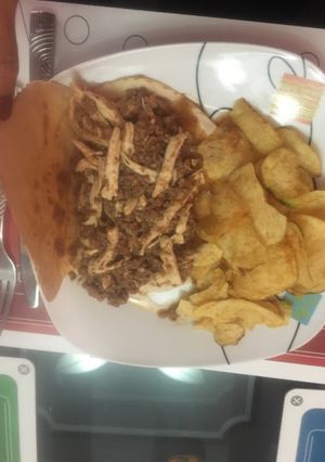 Una foto de TortillaMixta con salsa boloñesa