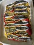 Anchoas al horno con patatas y pimientos