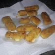 Palitos rebozados de queso cremoso
