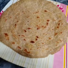 A picture of Roll paratha in desi ghee.