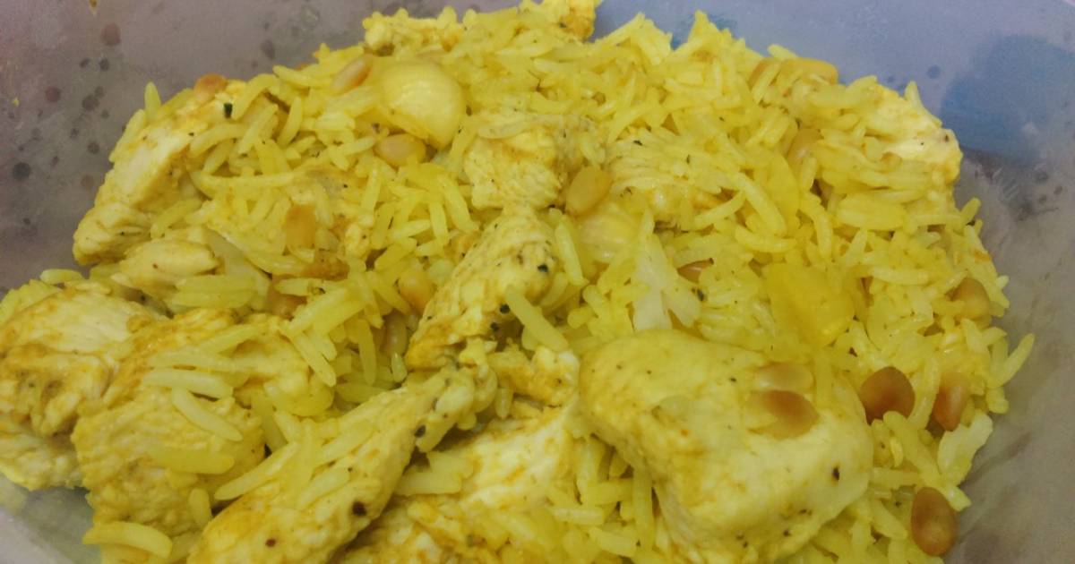 Arroz con pollo al curry, queso de cabra y frutos secos Receta de