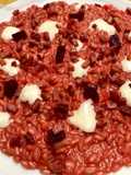 Risotto con barbabietola, speck e fonduta di taleggio