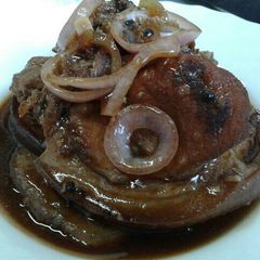 A picture of Marinated pork chops on soy sauce (Bistek).
