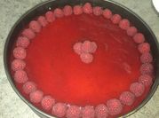 Una foto de tarta queso moras