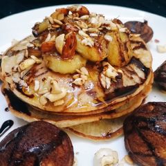 A picture of Banana pancakes and sweet appam.