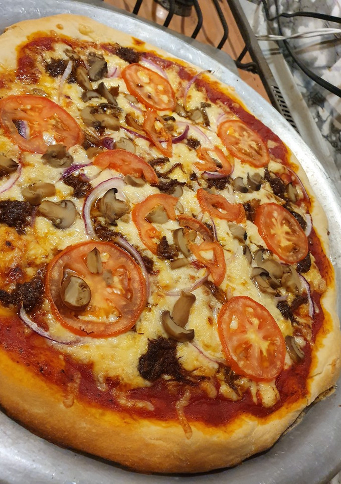 Una foto de Pizza