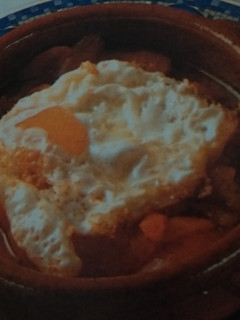 Una foto de Huevos fritos con pimientos morrones