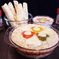 A picture of Pizza Biryani.