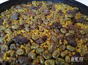 Una foto de mollejas de pollo con arroz