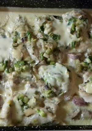 Una foto de Filet de merluza con una caricia de roquefort