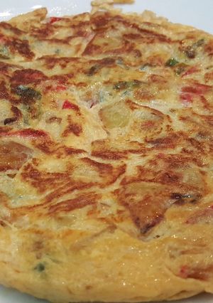 Foto principal de Tortilla de pimientos y cebolla